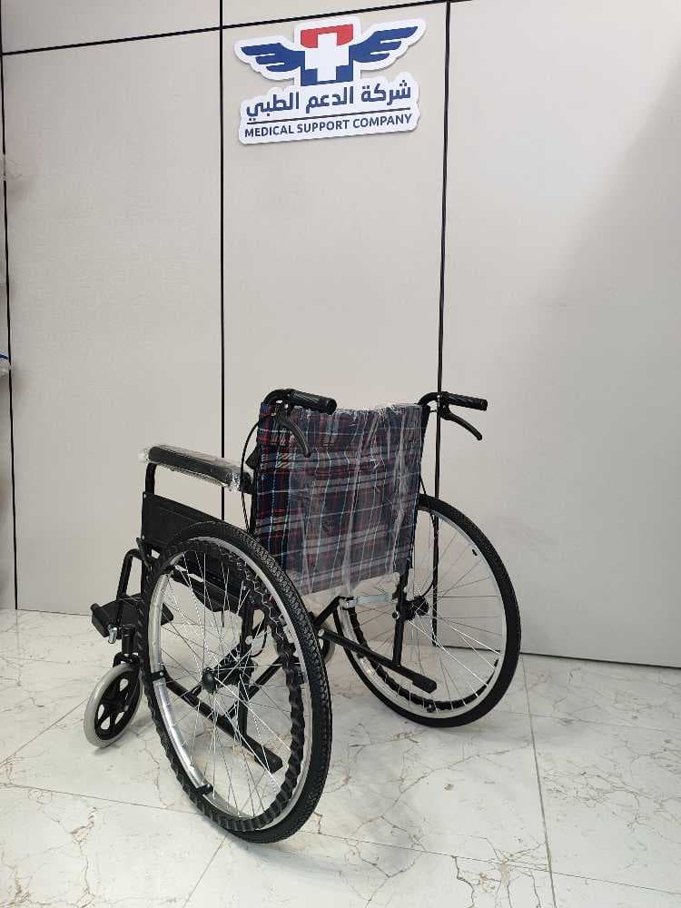 كرسي متحرك يدوي حديد وقماش مدعم