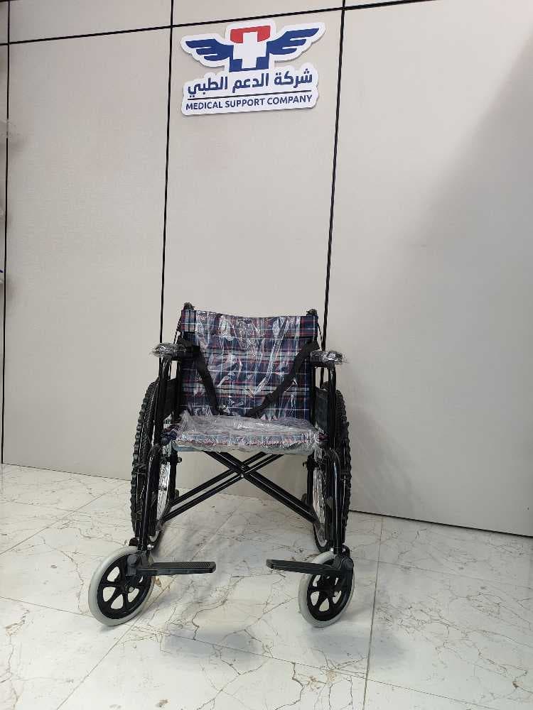 كرسي متحرك يدوي حديد وقماش مدعم