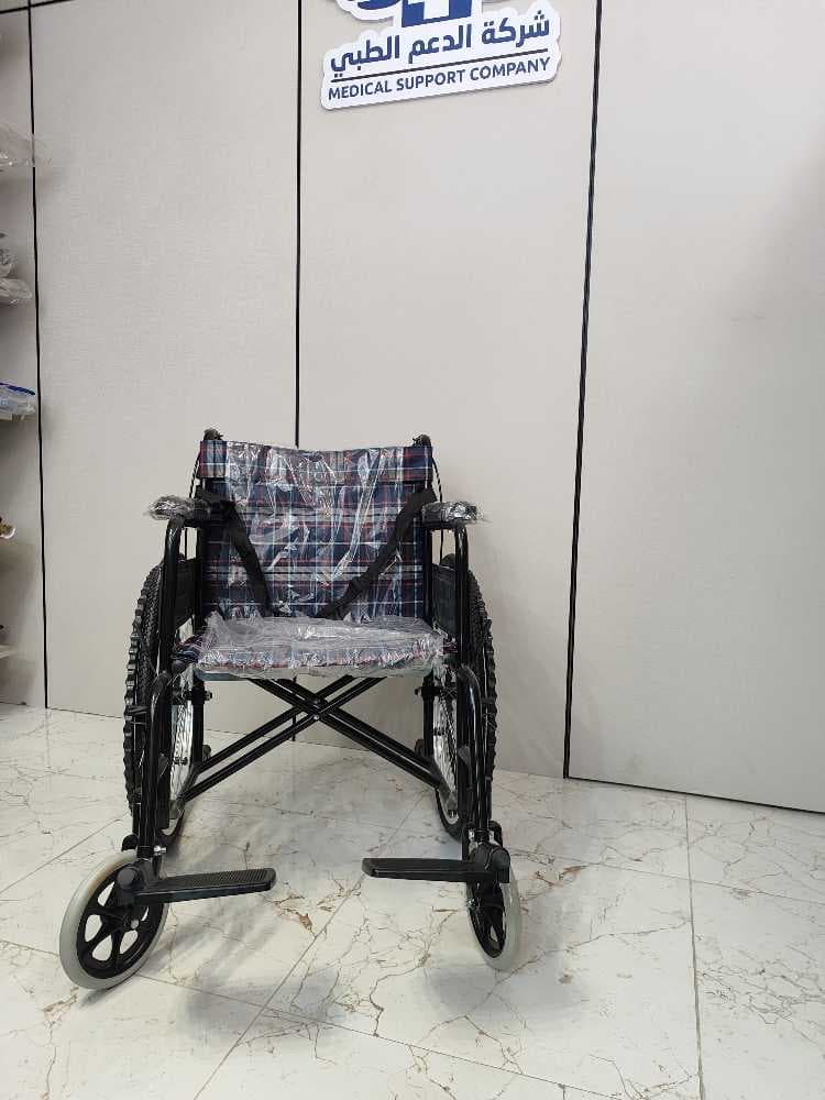 كرسي متحرك يدوي حديد وقماش مدعم